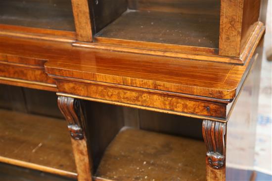 A Victorian figured walnut inverse breakfront library bookcase, W.6ft 1in. D.1ft 4in. H.7ft 6in.